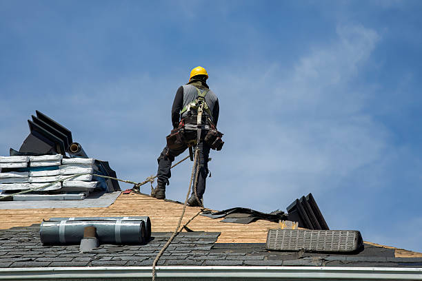 Professional Roof Replacement technician working in Freeport, ME